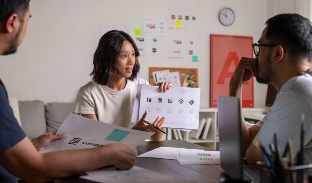 Marketing team discussing branding guidelines